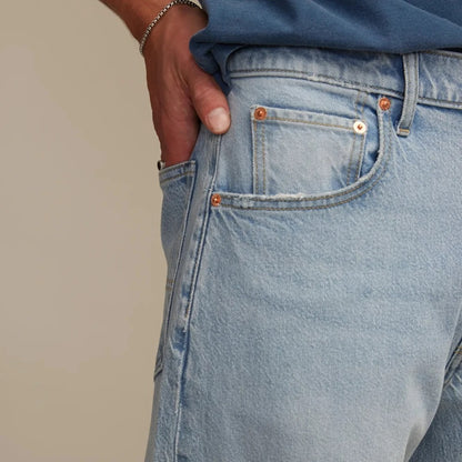 Jean homme bleu clair à taille haute et jambes amples
