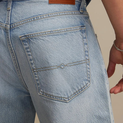 Jean homme bleu clair à taille haute et jambes amples