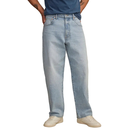 Jean homme bleu clair à taille haute et jambes amples
